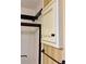 Bright bathroom features a shower with black and white tile and white cabinet at 109 Windcroft Nw Cir, Acworth, GA 30101