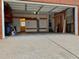 Spacious garage with high ceilings and room for storage and a workshop at 109 Windcroft Nw Cir, Acworth, GA 30101