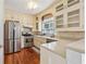 Kitchen featuring neutral cabinetry, stainless steel appliances, and eat in breakfast bar at 109 Windcroft Nw Cir, Acworth, GA 30101