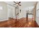Open living space with hardwood floors, open to kitchen and a staircase, creating an inviting atmosphere at 109 Windcroft Nw Cir, Acworth, GA 30101