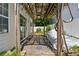 Charming covered patio features a pergola and a seamless transition to indoor living at 109 Windcroft Nw Cir, Acworth, GA 30101