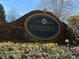 Community entrance sign with brick facade and beautiful floral arrangement at 109 Windcroft Nw Cir, Acworth, GA 30101