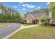 Community clubhouse exterior with well-maintained landscaping, providing a welcoming and attractive space at 1152 Ward Creek Sw Dr, Marietta, GA 30064