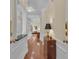 Foyer featuring hardwood floors, wainscoting, and stylish console table at 1152 Ward Creek Sw Dr, Marietta, GA 30064