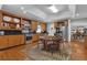 Eat-in kitchen boasts modern appliances, light wood cabinets, and granite countertops at 1152 Ward Creek Sw Dr, Marietta, GA 30064