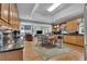Spacious eat-in kitchen boasts granite counters, stainless appliances and opens to living room at 1152 Ward Creek Sw Dr, Marietta, GA 30064