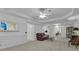 Comfortable living room with unique decor, neutral carpet, and plenty of natural light at 1152 Ward Creek Sw Dr, Marietta, GA 30064