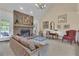 Inviting living room with a stone fireplace, creating a cozy and comfortable atmosphere at 1152 Ward Creek Sw Dr, Marietta, GA 30064
