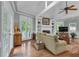 Bright living room featuring a fireplace, built-in shelving, and hardwood flooring at 1152 Ward Creek Sw Dr, Marietta, GA 30064