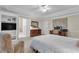 Main bedroom featuring a TV, doorway to another room, and a seating area with a recliner at 1152 Ward Creek Sw Dr, Marietta, GA 30064