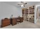 Elegant home office with custom built-in bookshelves and a spacious work area at 1152 Ward Creek Sw Dr, Marietta, GA 30064