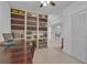 Charming office space with an extensive built-in bookcase for showcasing literary collections at 1152 Ward Creek Sw Dr, Marietta, GA 30064