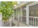 Beautiful screened porch with a skylight and stairs leading to the tranquil garden at 1152 Ward Creek Sw Dr, Marietta, GA 30064