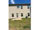 Backyard with patio and two-story siding at 11600 Winston Dr, Hampton, GA 30228