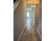 Inviting hallway with wood-look flooring leading to the living areas at 11600 Winston Dr, Hampton, GA 30228
