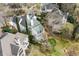 Aerial view of the property showcasing the backyard, patio, and surrounding landscape at 4 Vale Close Ne Ct, Atlanta, GA 30324