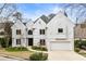Stunning two-story home with unique architectural design and manicured front yard at 4 Vale Close Ne Ct, Atlanta, GA 30324