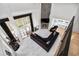 Sunken living room with high ceilings, fireplace, and large windows at 4 Vale Close Ne Ct, Atlanta, GA 30324