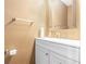 Stylish half-bathroom with modern vanity, fixtures, and neutral color palette at 48 Savanna Ct, Powder Springs, GA 30127