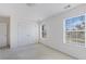 Bright bedroom with natural light, a closet, and neutral carpet at 48 Savanna Ct, Powder Springs, GA 30127