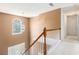 Bright foyer featuring a window and an elegant pendant light fixture at 48 Savanna Ct, Powder Springs, GA 30127