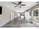 Spacious living room with hardwood floors, bright windows, and open floor plan at 48 Savanna Ct, Powder Springs, GA 30127