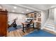 Finished basement featuring a home office area, gym space, and storage at 504 Kingswood Nw Ln, Atlanta, GA 30305