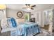 Comfortable bedroom with a large window, comfortable bed and an en suite bathroom at 504 Kingswood Nw Ln, Atlanta, GA 30305
