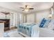 Bedroom with a ceiling fan, double closets, wood floors and access to en suite bathroom at 504 Kingswood Nw Ln, Atlanta, GA 30305