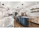 Kitchen featuring an island, stainless steel appliances, and open shelving at 504 Kingswood Nw Ln, Atlanta, GA 30305