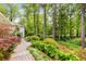 Lush landscaping frames this home, creating an inviting and picturesque setting at 504 Kingswood Nw Ln, Atlanta, GA 30305