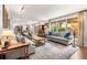 Spacious living room with hardwood floors and large windows providing ample natural light at 504 Kingswood Nw Ln, Atlanta, GA 30305
