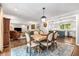 Open concept living space featuring living room, dining room, and kitchen at 504 Kingswood Nw Ln, Atlanta, GA 30305