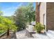 Brick home backyard with water access, generator, stone patio and beautiful landscaping at 160 Old Mill Ct, Fayetteville, GA 30214