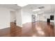 Finished basement with wood floors, kitchenette, and stairs to the main level at 160 Old Mill Ct, Fayetteville, GA 30214