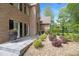 Brick home with black shutters, potted plants and professional landscaping at 160 Old Mill Ct, Fayetteville, GA 30214