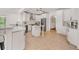 Spacious kitchen with an island, stainless appliances, granite countertops, and plenty of cabinet space at 160 Old Mill Ct, Fayetteville, GA 30214
