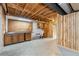 Spacious basement with wood walls and storage at 1690 Cedar Grove Dr, Marietta, GA 30066