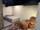 Basement bedroom with bed, accent chair, and rug at 1690 Cedar Grove Dr, Marietta, GA 30066