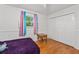 Bedroom featuring wood floors and a closet at 1690 Cedar Grove Dr, Marietta, GA 30066