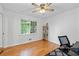 Bedroom with wood floors and fan at 1690 Cedar Grove Dr, Marietta, GA 30066