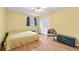 Bedroom featuring hardwood floors, a ceiling fan, and closet at 1690 Cedar Grove Dr, Marietta, GA 30066