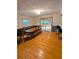 Charming dining room with hardwood floors, large table, and lots of natural light at 1690 Cedar Grove Dr, Marietta, GA 30066