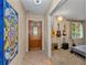 Welcoming entryway featuring unique decor and a classic wooden door leading into the home at 1690 Cedar Grove Dr, Marietta, GA 30066