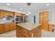 Well-equipped kitchen featuring wood cabinets, granite counters, and stainless steel appliances at 1690 Cedar Grove Dr, Marietta, GA 30066