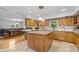 Spacious kitchen featuring a granite island, ample cabinet space, and modern appliances for culinary enthusiasts at 1690 Cedar Grove Dr, Marietta, GA 30066