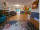 Inviting living room with fireplace, hardwood floors and an open floor plan leading to the kitchen and dining area at 1690 Cedar Grove Dr, Marietta, GA 30066