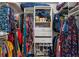 Organized walk-in closet with ample storage for clothes, shoes, and accessories at 1690 Cedar Grove Dr, Marietta, GA 30066