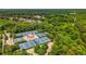 Aerial view of the community tennis courts surrounded by lush green trees at 2043 Mason Mill Rd, Decatur, GA 30033