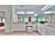 A bathroom features a white dual sink vanity with a large mirror and tan countertops, and a shower at 2043 Mason Mill Rd, Decatur, GA 30033